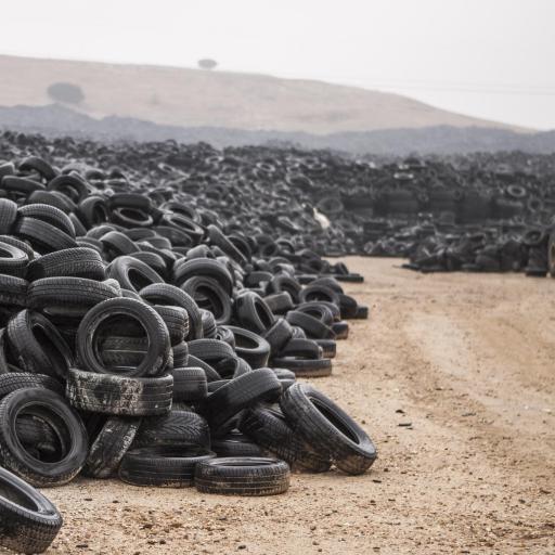 A mountain of old and discarded tires