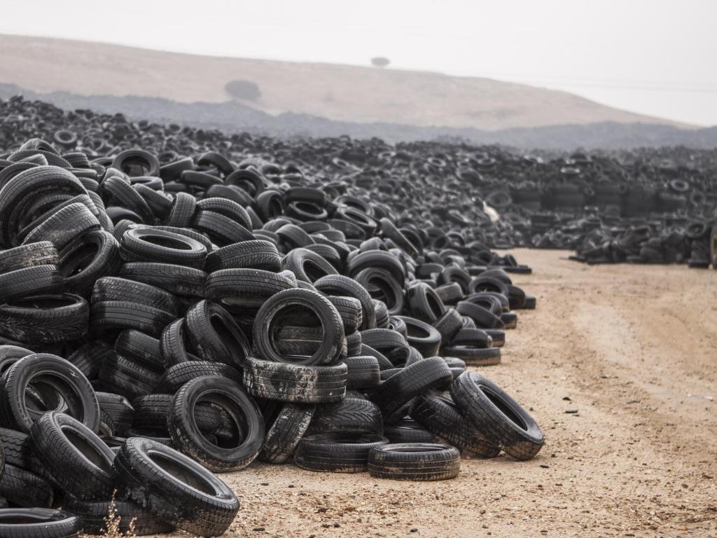 A mountain of old and discarded tires